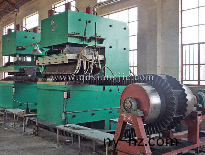 攩(dang)邊(bian)帶硫化(hua)機(jī)(ji)